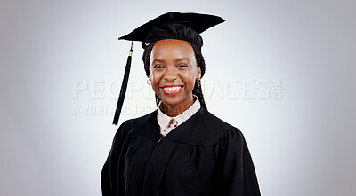 Graduate, black woman and portrait with smile from college and academy achievement in studio. Happy, university student and school success with white background and African female person with study