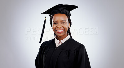 Buy stock photo Graduate, black woman and portrait with smile from college and academy achievement in studio. Happy, university student and school success with white background and African female person with study