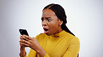 Woman, reading phone and shocked for news, social media and online error or mistake on a white background. African person confused, surprise and stress on mobile for scam or notification in studio