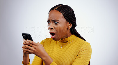 Buy stock photo Woman, reading phone and shocked for news, social media and online error or mistake on a white background. African person confused, surprise and stress on mobile for scam or notification in studio