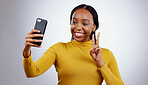 Studio, peace sign or black woman taking selfie on social media with confidence, post or smile. African lady, memory or happy influencer taking a photograph, vlog or picture online on grey background