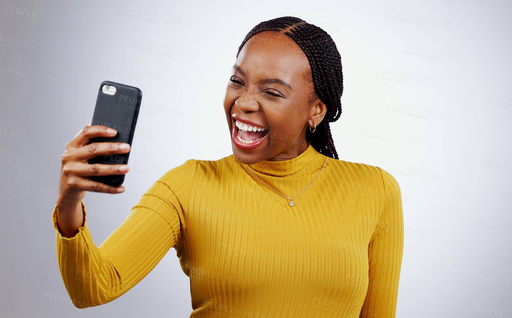 Buy stock photo Happy woman, selfie or video call for social media, influencer content creation and online blog on a white background. African person with smile and excited for profile picture photography in studio