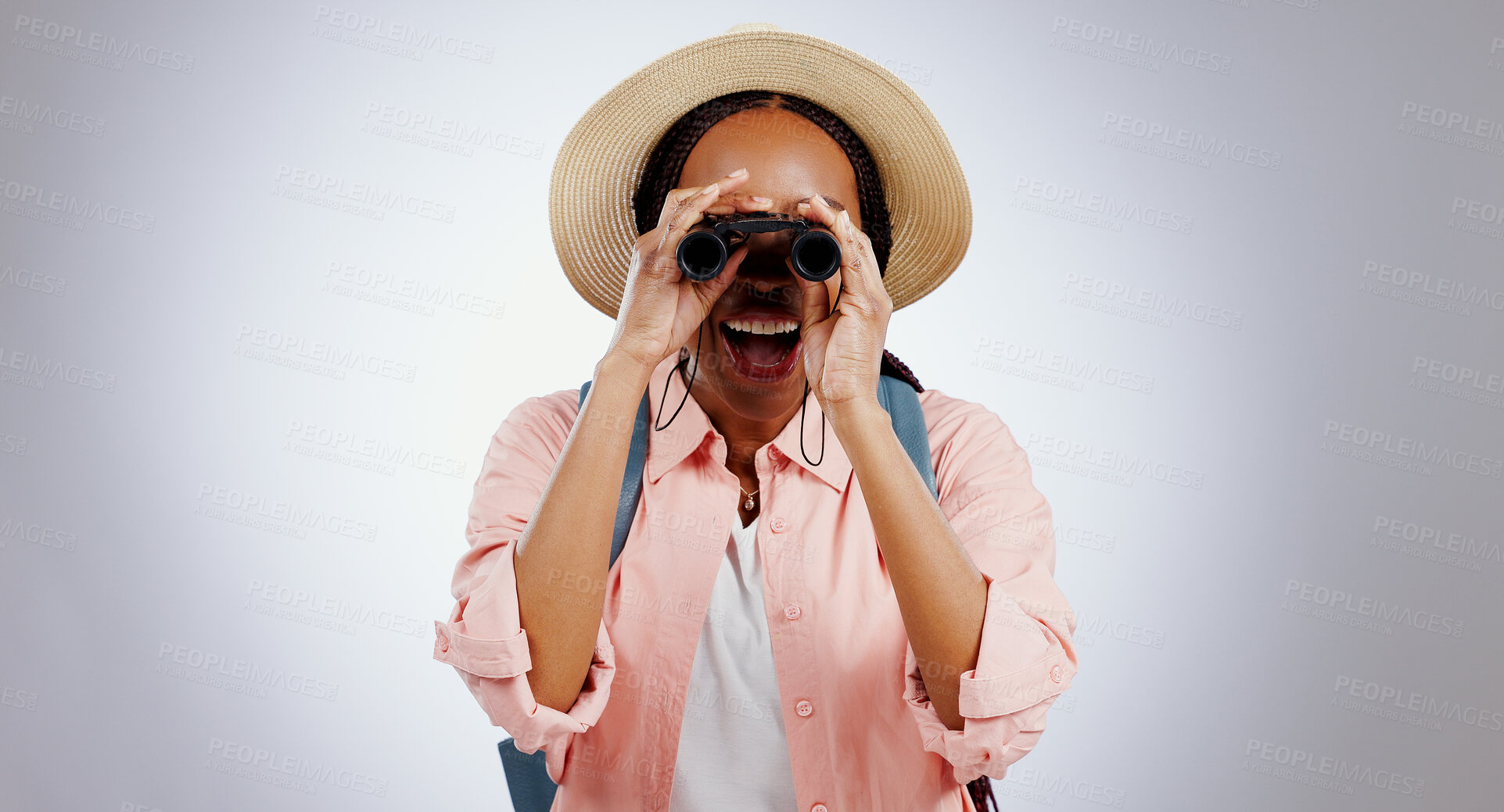 Buy stock photo Woman, binocular or smile in studio for travel, hiking or sightseeing with backpack on gray background. Black person, telescope lens or happiness for search, adventure and experience on mock up space