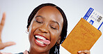 Selfie, face or happy black woman with a passport in studio for holiday travel or post vacation trip online. Grey background, social media or African tourist with ticket or tongue out in celebration 