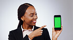 Business woman, phone green screen and mockup for presentation, marketing or sign up information in studio. Professional african worker on mobile app for job news or opportunity on a white background