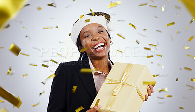 Portrait, confetti and business with black woman, gift and celebration on a white studio background. Face, African person and employee with a present, winning and hat with happiness and achievement