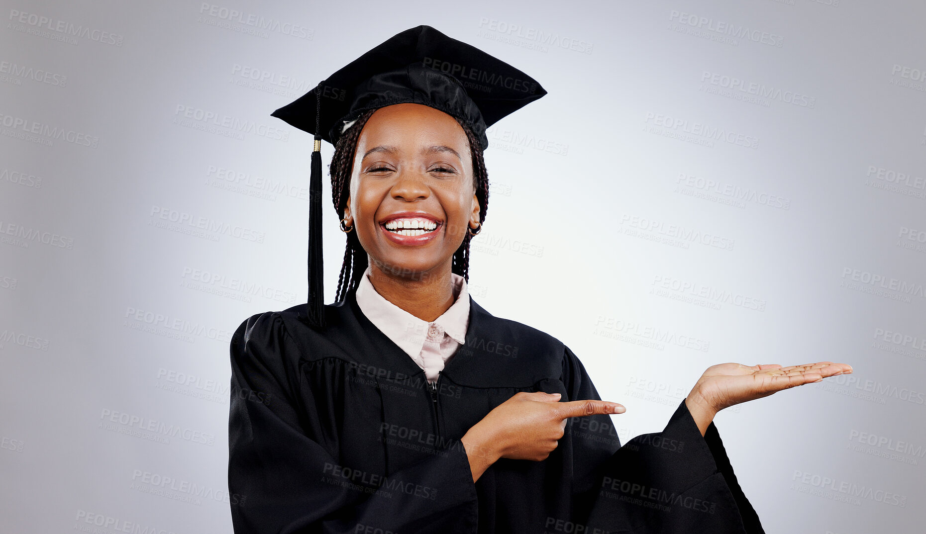 Buy stock photo Graduate, black woman and portrait with pointing to college deal and academy promotion in studio. Happy, university student and school marketing with white background and African person with study