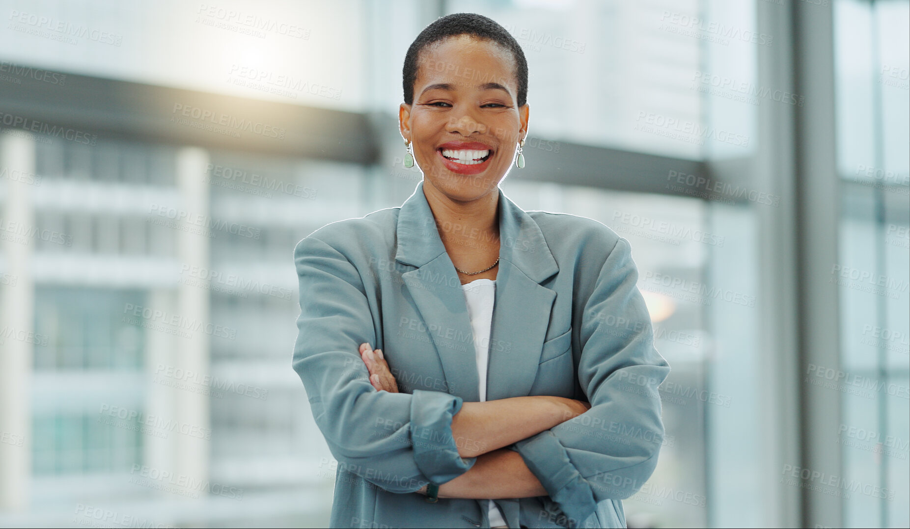 Buy stock photo Portrait, business woman and smile with arms crossed for pride, confidence and working in human resources agency in Nigeria. Happy african employee, HR manager or expert staff in professional company