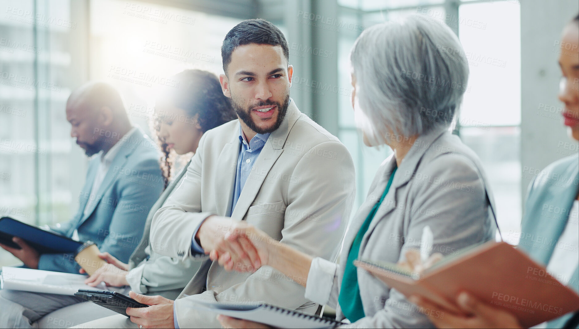 Buy stock photo Business people, handshake and meeting in seminar greeting, introduction or teamwork at office. Businessman shaking hands with woman in staff training, team workshop or recruiting deal at workplace