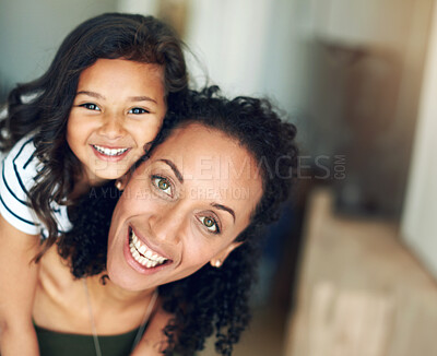 Buy stock photo Portrait of a mother and daughter bonding together at home