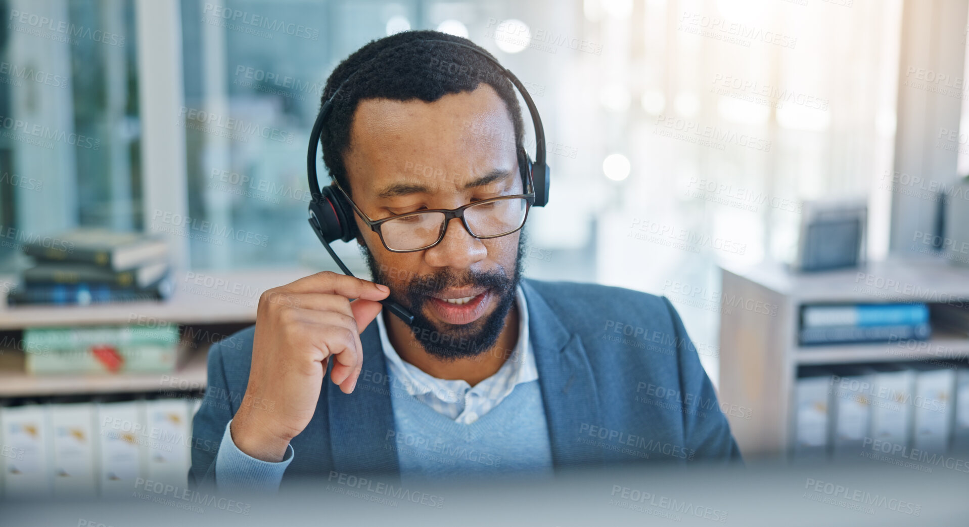 Buy stock photo Computer, call center and support with a black man consultant working in customer service for assistance. Contact, crm and headset communication with an employee consulting in an office for sales