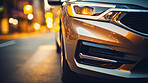 Headlight, vehicle and car for dealership salon, car sales and service repair in city streets at night. Close-up, lights and bokeh of modern and sleek automobile for ownership, competition or mechanic