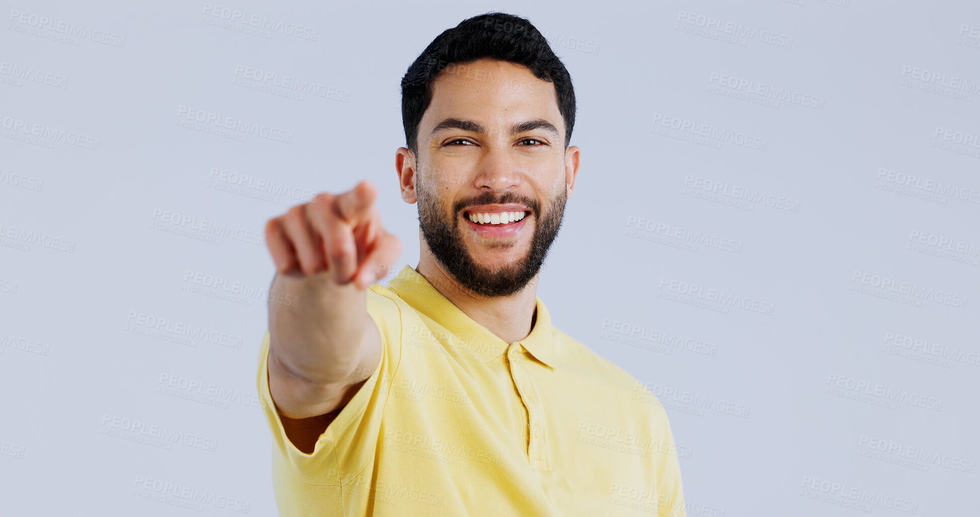 Buy stock photo Man, portrait and pointing to you in studio for choice, decision and vote for winner, volunteer or recruitment on white background. Happy indian model show finger for support, emoji and invitation 