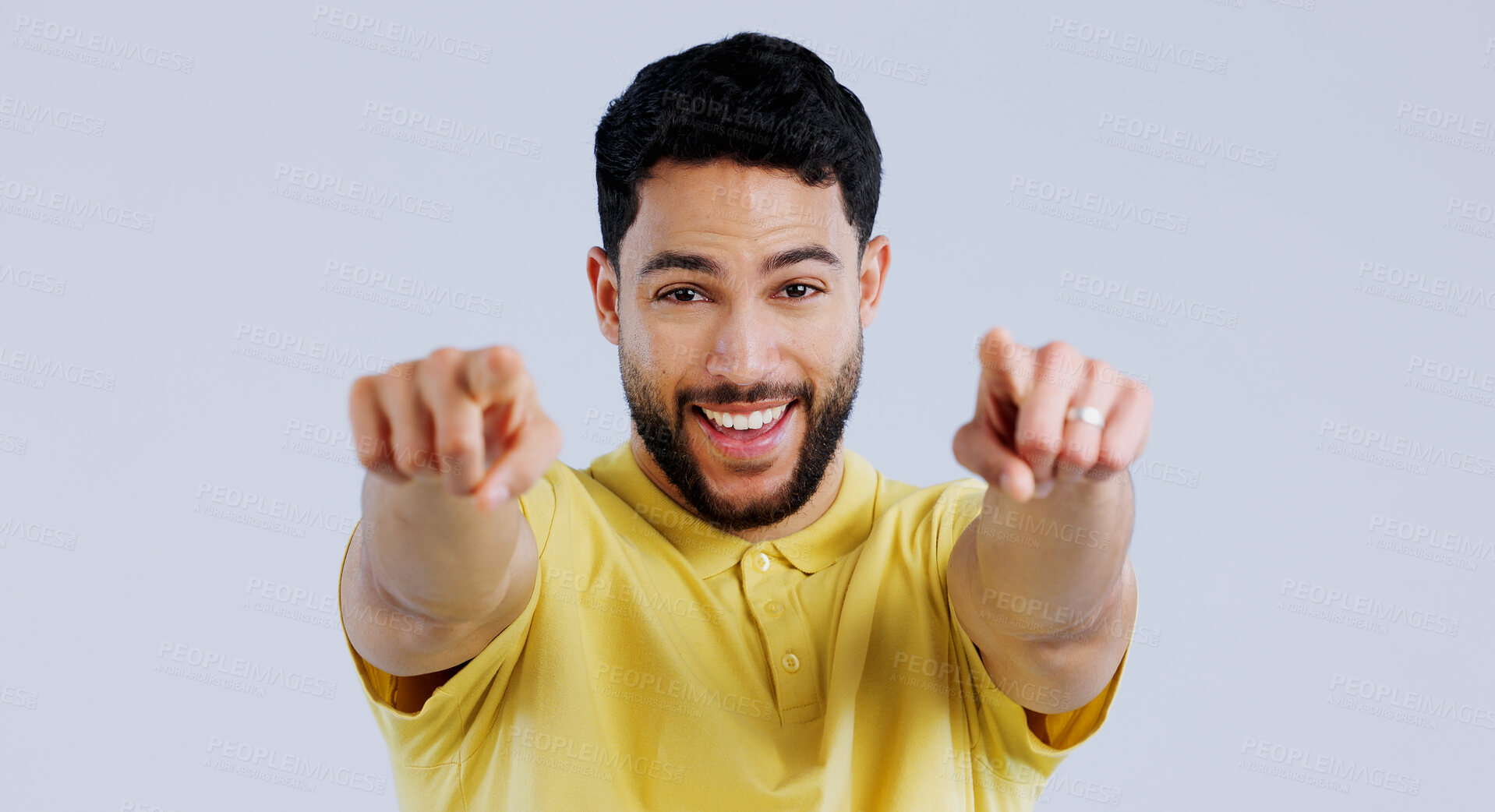 Buy stock photo Happy man, portrait and pointing to you for choice, decision and vote for winner, volunteer or recruitment in studio on white background. Indian model, smile and finger for support, emoji and join us