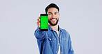 Man, smartphone or green screen in portrait with smile, mockup space or happy for advertising. Arab person, phone or face in marketing by tracking markers, mobile app or contact by white background