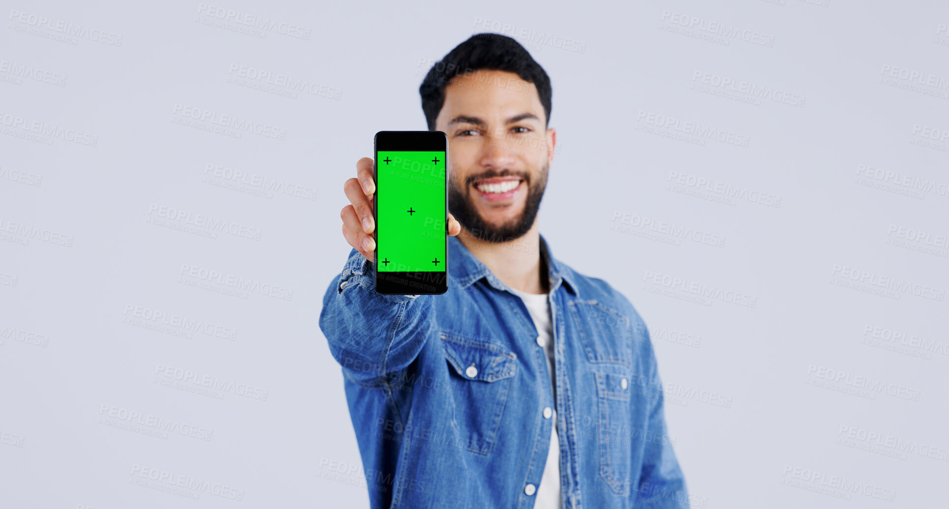 Buy stock photo Man, smartphone or green screen in portrait with smile, mockup space or happy for advertising. Arab person, phone or face in marketing by tracking markers, mobile app or contact by white background