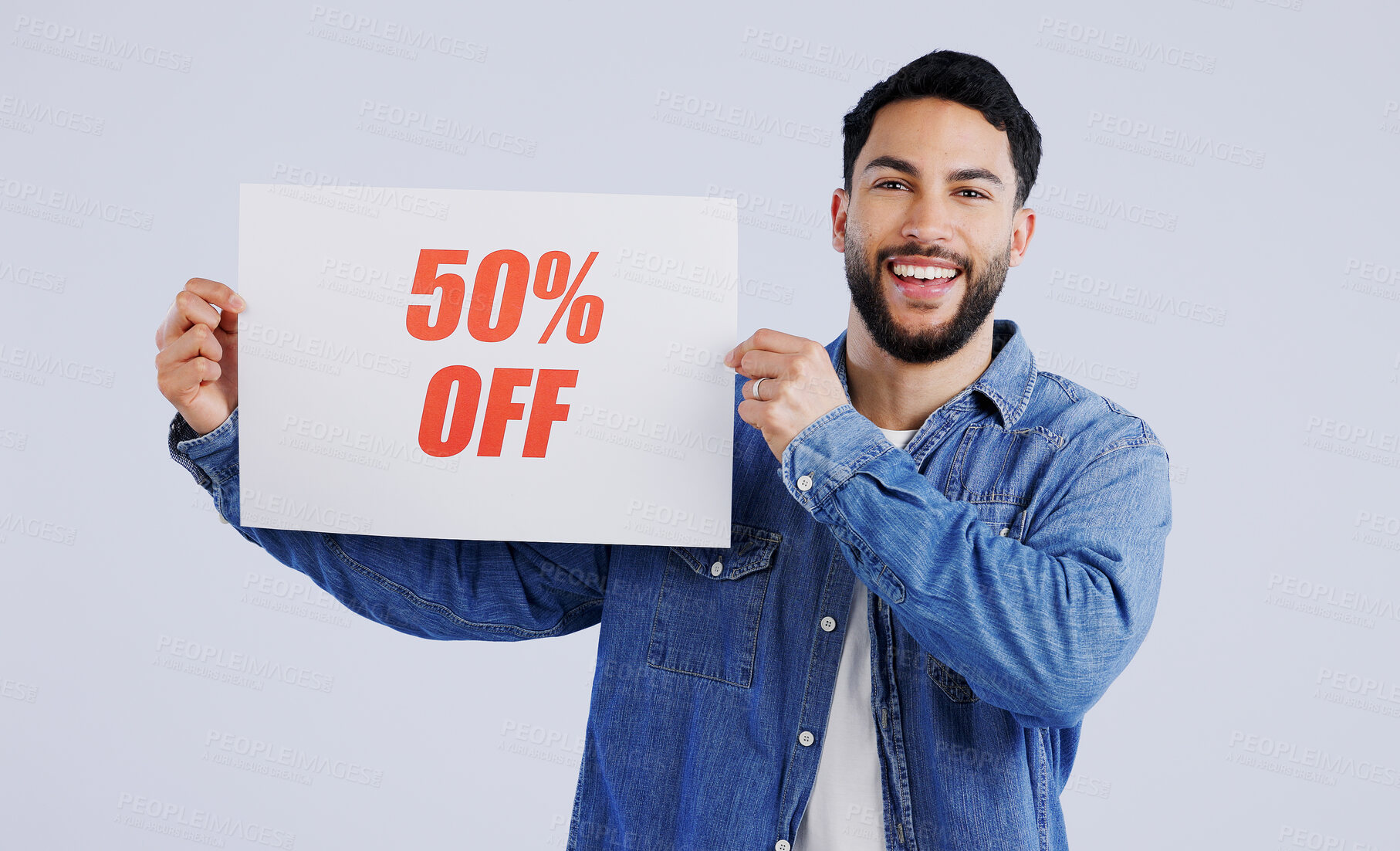 Buy stock photo Man, poster and excited with sale in portrait, shopping discount and retail announcement by studio mockup. Young person, paper and board for sales promotion with news launch by white background