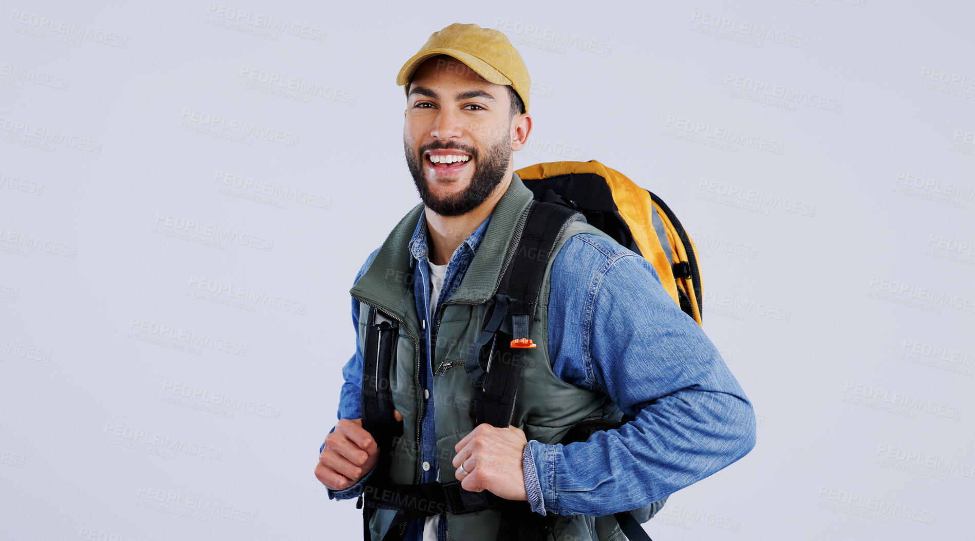 Buy stock photo Happy man, portrait and backpack on mockup for hiking, adventure or travel against a studio background. Male person, model or hiker smile with bag for trekking journey, exercise or outdoor fitness