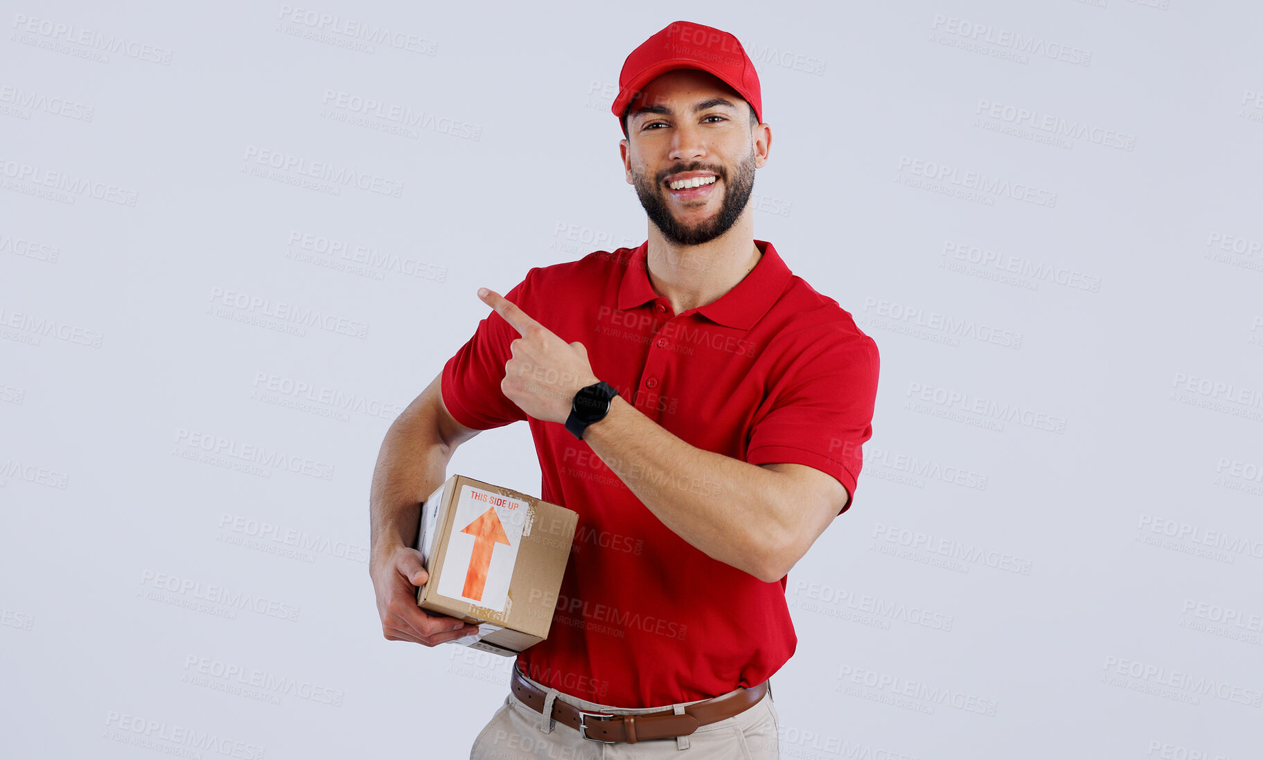 Buy stock photo Courier man, box and studio portrait with pointing, smile and happy for delivery, shipping or supply chain. Logistics expert, happy and cardboard package for commercial job with product by background