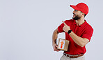 Man, courier and pointing with delivery in studio with mock up for offer on white background in Mexico. Male model, hand and gesture for announcement, promotion or notification in space for logistics