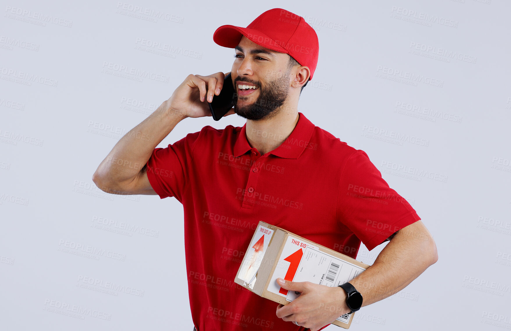 Buy stock photo Man, delivery and phone for communication in studio for courier mock up on white background in Mexico. Male model, package or box with smile for conversation for logistics, parcel or order in space