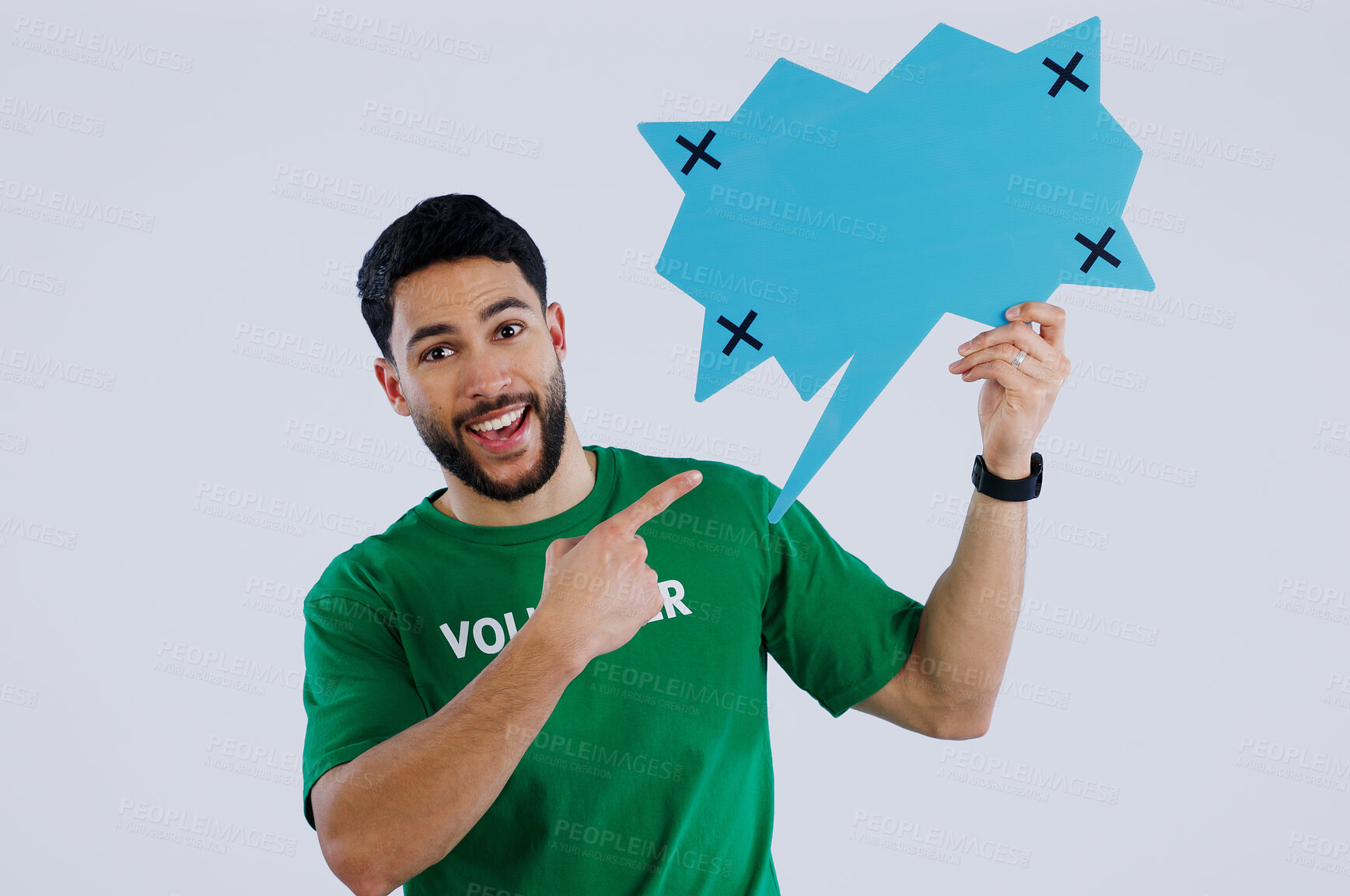 Buy stock photo Portrait, man and volunteer with speech bubble, pointing and promotion on a white studio background. Face, person and charity worker with poster board, tracking markers and options with communication