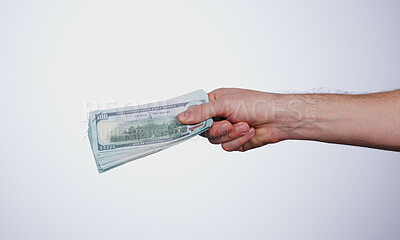 Hand, payment and closeup of money in a studio for retail shopping, paying bills or debt. Mockup, paper cash and zoom of person with dollar bank notes for buying products isolated by white background.