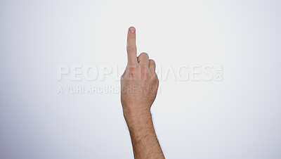Finger, hand and click tablet in studio isolated on a white background mockup space. Closeup, touchscreen and press, scroll or swipe on digital technology, phone and gesture on mobile internet app.