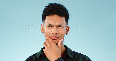Buy stock photo Thinking, confused and portrait of man with doubt in studio isolated on a blue background mockup space. Face, idea and person with question, contemplating and problem solving, choice and decision