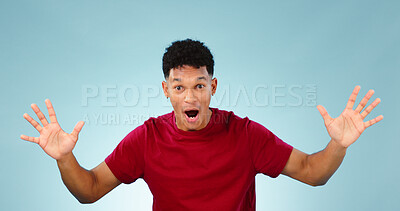 Buy stock photo Man, surprise and happy for prize, portrait or excited with face, good news and blue studio background. Energy, winning and wow for achievement, competition and hands for success, winner and offer
