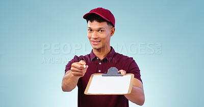 Buy stock photo Courier man, clipboard and signature in studio portrait, smile and service with pen by blue background. African delivery guy, paperwork and document for commerce, logistics or writing in shipping job