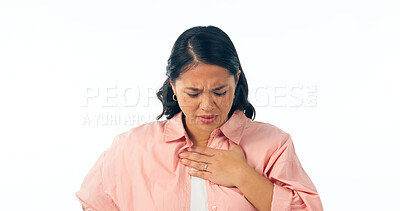Buy stock photo Chest pain, hands and woman in studio for heart attack, anxiety or emergency on white background. Stress, face and Japanese model with lung, asthma or breathing problem, fail or heartburn indigestion