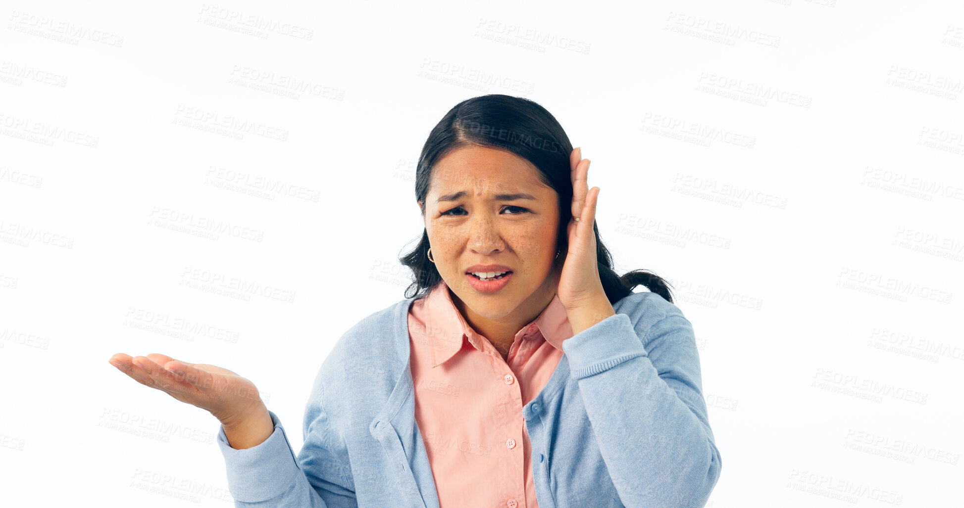 Buy stock photo Confused, portrait and deaf woman with hand on ear in studio for speak up, volume or huh on white background. Doubt, face or Asian model with hearing loss, problem or frustrated by communication fail