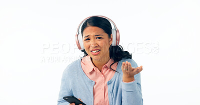 Buy stock photo Woman, confused and smartphone in portrait in headphones, music and streaming in question in studio mockup. Young person, asian and doubt on face, audio playlist and online radio by white background