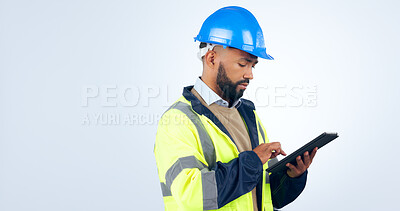 Buy stock photo Man, tablet and typing online for engineering, project management and construction update in studio. Industry worker with digital technology for blueprint or architecture plan on a white background