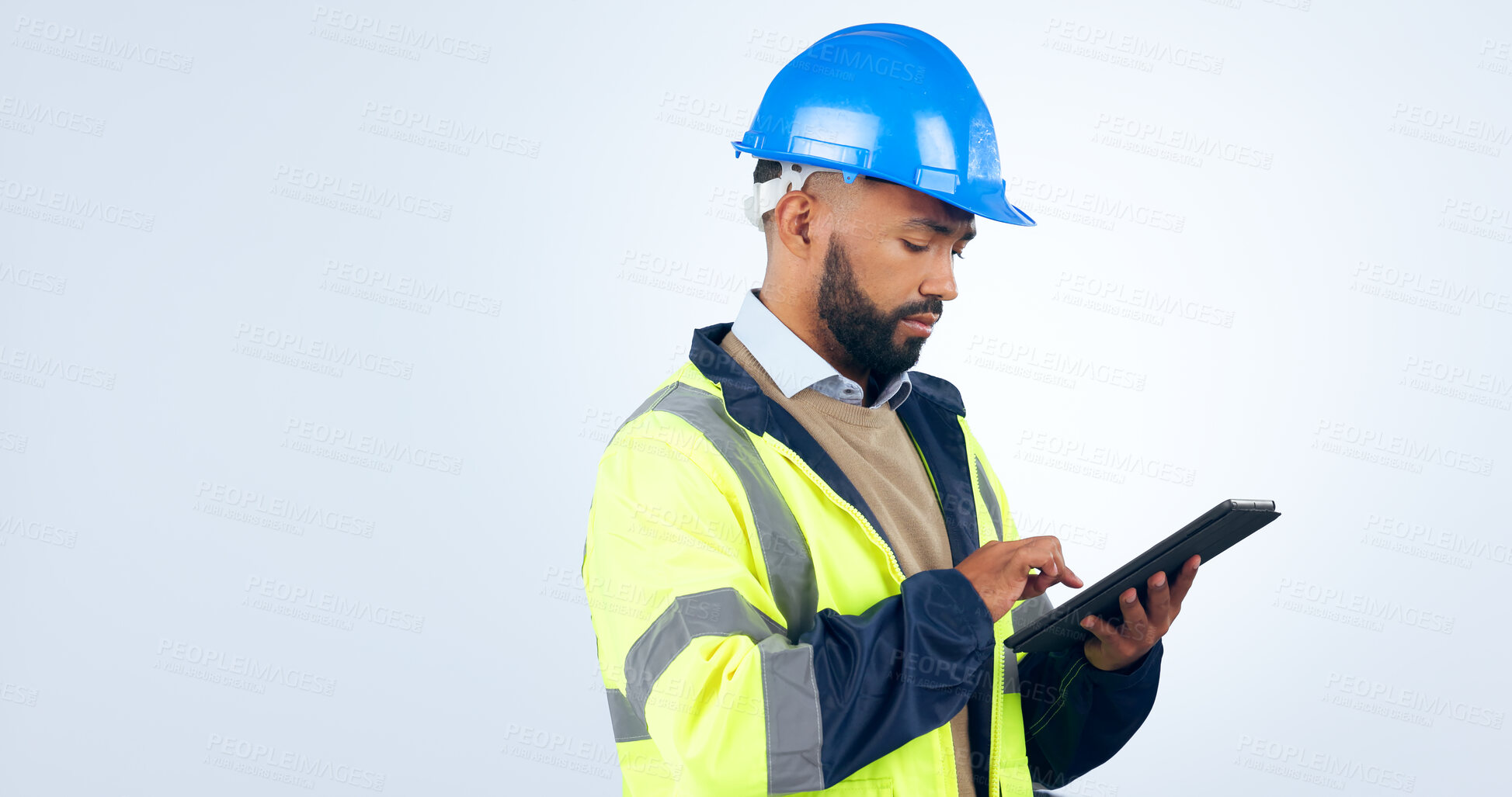 Buy stock photo Man, tablet and typing online for engineering, project management and construction update in studio. Industry worker with digital technology for blueprint or architecture plan on a white background