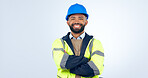Happy man, portrait and professional architect in confidence with arms crossed against a studio background. Male person, contractor or engineer smile with hard hat for construction on mockup space