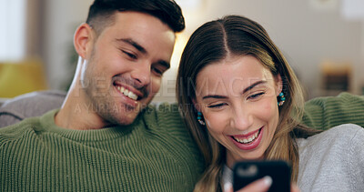 Buy stock photo Happy, phone and couple on sofa for social media, internet and reading funny website together. Dating, home and man and woman on smartphone laugh for meme and bonding, relax and love in living room