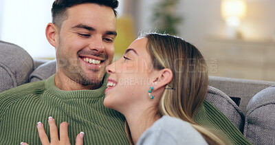 Buy stock photo Love, smile and young couple on a sofa for bonding at apartment on a romantic date in conversation. Happy, positive and man and woman from Canada relaxing together in living room at modern home.
