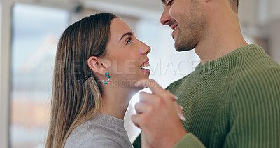 Buy stock photo Love, dancing and young couple bonding at apartment on a romantic date listening to music or playlist. Happy, positive and man and woman from Canada moving to song in living room of modern home.