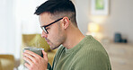 Closeup, man and drinking of coffee in home for relaxing, comfort or delicious taste in morning. Person, male entrepreneur and glasses for remote work with steam for espresso, latte or cappuccino