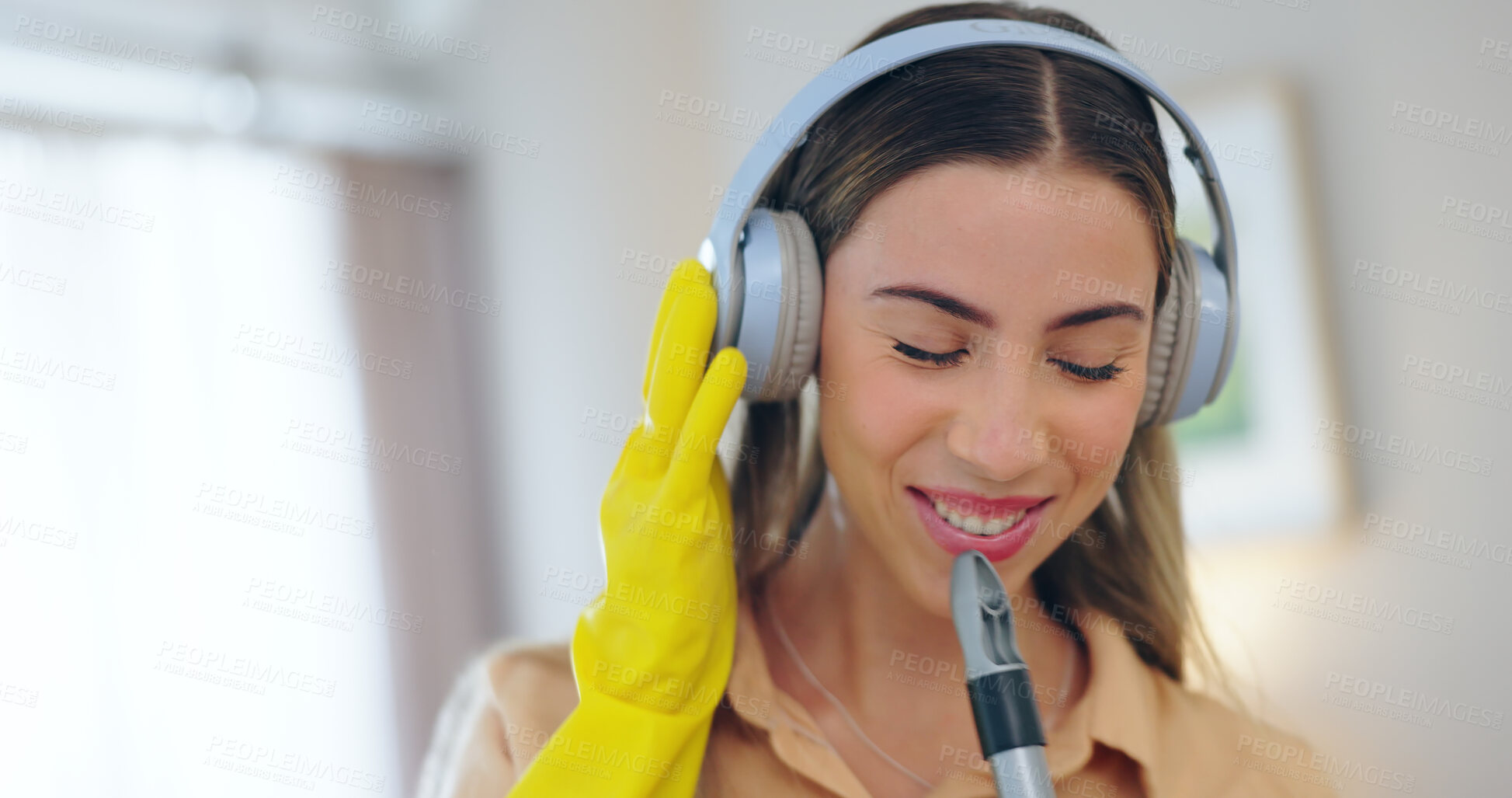 Buy stock photo Woman, headphones and cleaning house or music, smile and streaming radio or audio, sound and song. Happy female person, sweeping and karaoke at home, freedom and housekeeping or podcast for hygiene