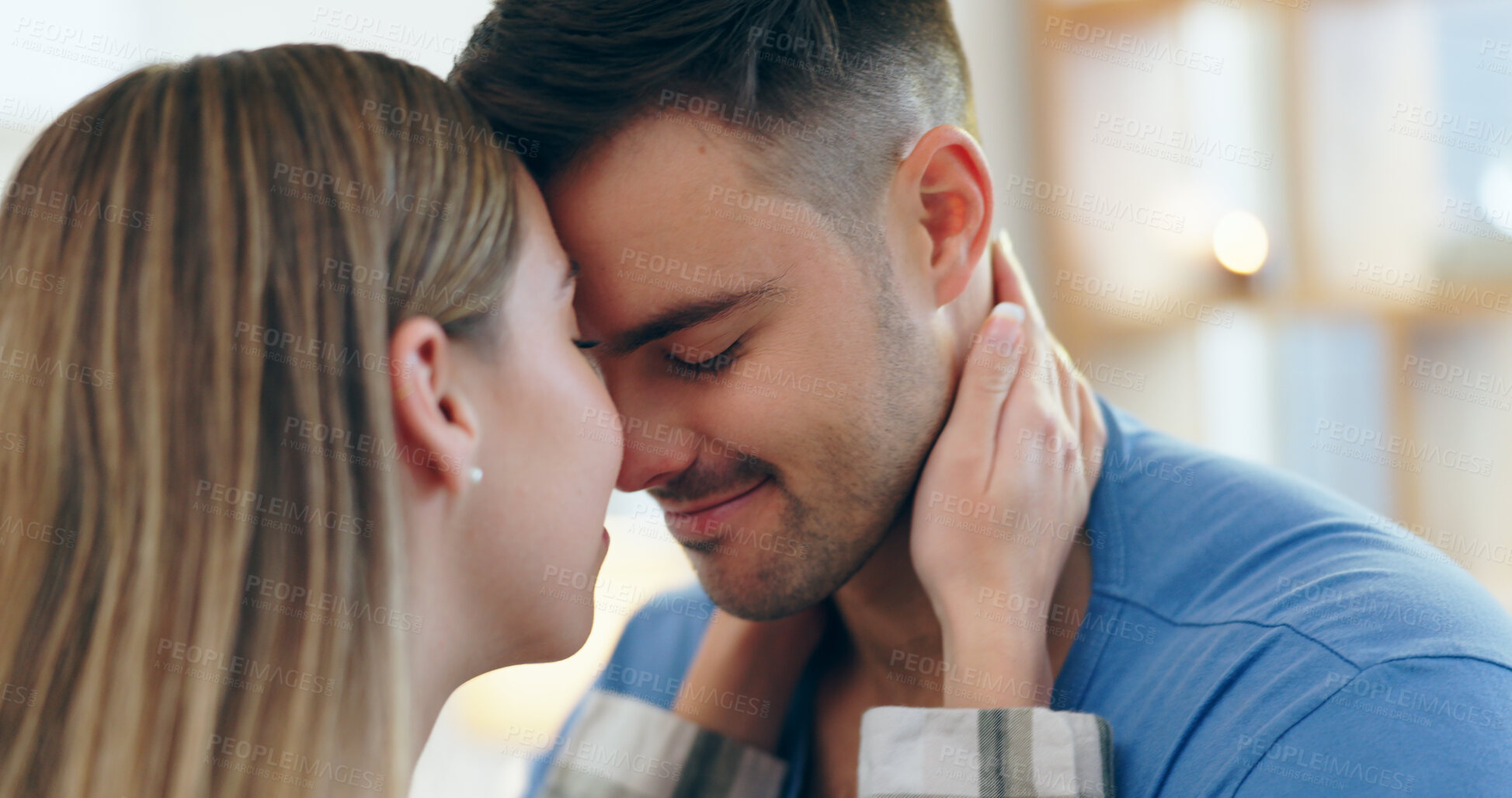Buy stock photo Love, smile and young couple bonding at apartment on romantic date with intimate moment. Happy, positive and man and woman from Canada with cute forehead affection for romance together at modern home