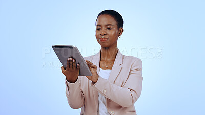 Business, research or black woman in studio with tablet for schedule planning on blue background. Internet, scroll or female African entrepreneur with technology for online review, news or feedback