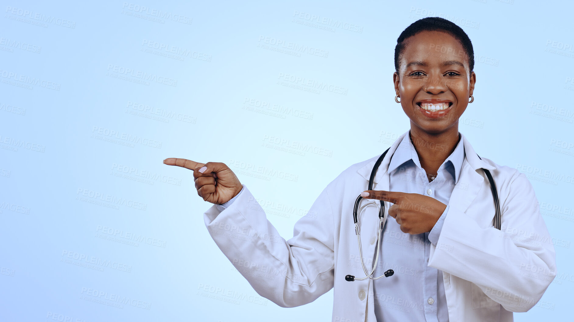 Buy stock photo Doctor, portrait and pointing for presentation in studio with smile, announcement or advertising space. Black woman, face and happy for marketing, showing deal or discount with hand or joy on mockup