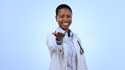 Buy stock photo Portrait, black woman and doctor with open palm, promotion and healthcare on a blue studio background. Face, African person and professional with donation, charity and medical with welcome or support