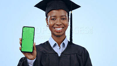 Buy stock photo Graduate, woman and phone green screen for university marketing, contact or information on blue background. Portrait of graduation student with mobile app mockup, e learning and education in studio