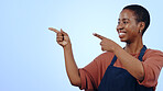 Woman, smile and pointing for presentation in studio with hands, announcement or advertising space. Black person, face and happy for marketing, showing deal or discount with confidence on mock up