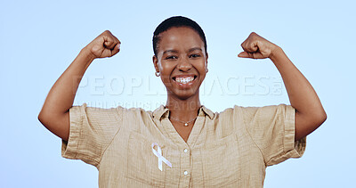 Buy stock photo Portrait, woman or arm flex with smile in studio for breast cancer winner, solidarity or muscle for feminism on mock up space. Black person, face or happy and flexing on blue background for awareness