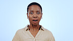 Woman, portrait and surprised in studio for announcement, notification or overwhelmed on blue background. Black person, face and shocked with wow expression for gossip, surprise or secret on mock up